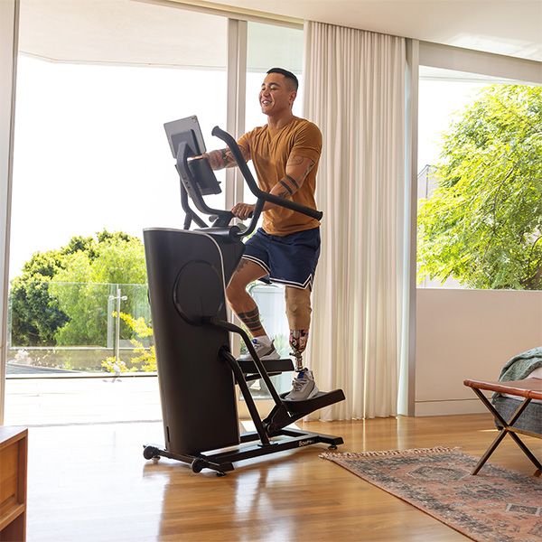 person-on-elliptical-crioss-trainer-600-600 Smash Your Training Goals This Winter [Home Gym Setup Guide]