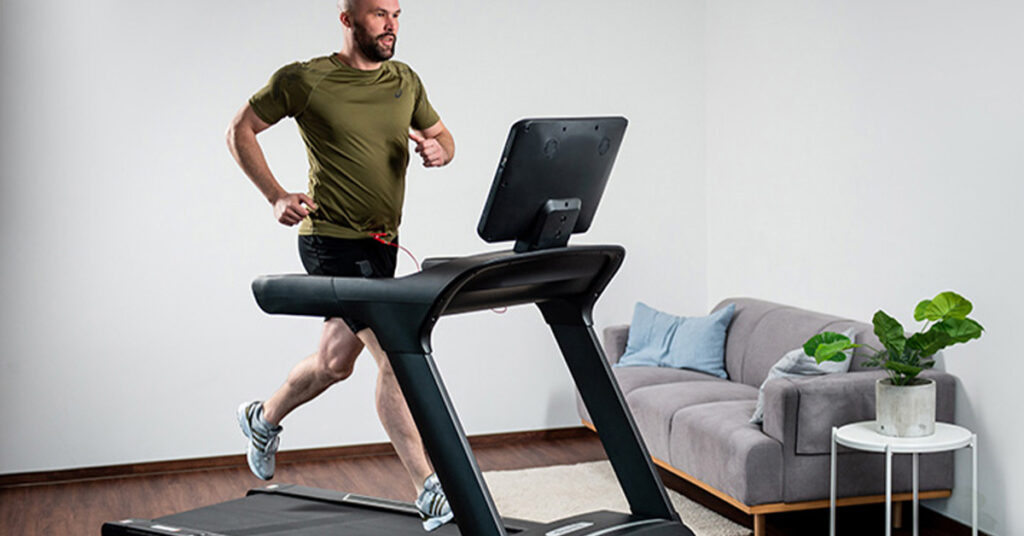 person-running-on-treadmill-home-gym-1200-628-1024x536 Smash Your Training Goals This Winter [Home Gym Setup Guide]